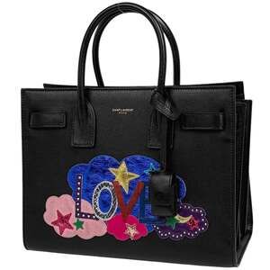 Saint Laurent Sac de Jour handbag with star patchwork, black leather, 413047,...
